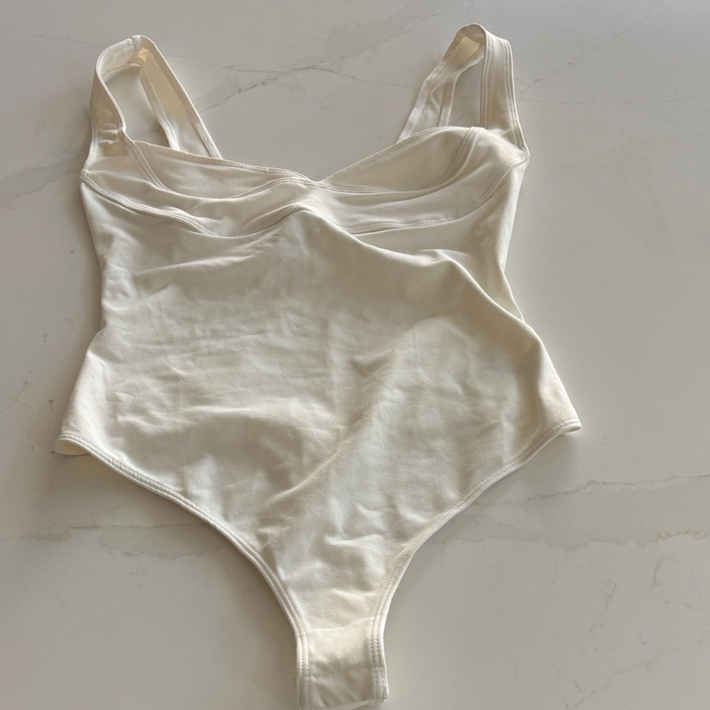 Free People Intimately NWT tank bodysuit. Cream, size XS